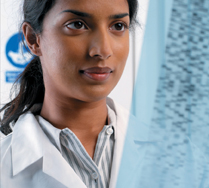 A molecular biologist analyzing a DNA sequence.