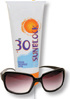 A pair of sunglasses and a tube of sunblock with spf 30.