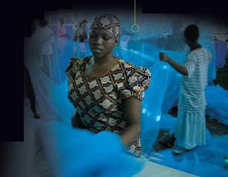 An African women folding nets.