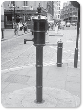 A photograph of a broad street pump.