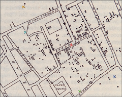 A physical map of London indicating cholera outbreak. The dots indicate the location of people who died because of cholera. The cross marks indicate the pumps.