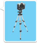 A tripod has three legs extending from a camera down to three points on the floor.