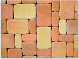 A picture consists of bricks of varying size, connected in no apparent pattern.
