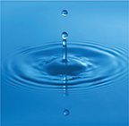 A drop falls into water, creating a ripple effect.
