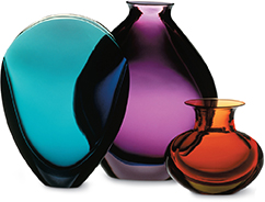 Three glass vases in varying shapes and sizes.