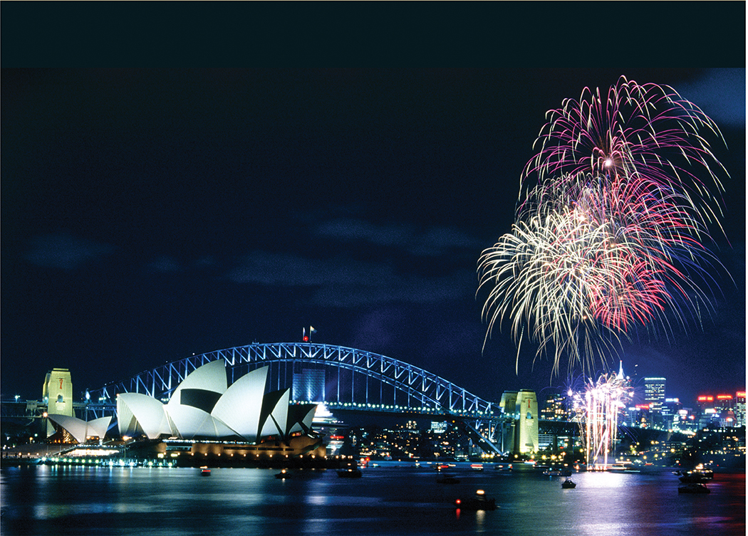 Fireworks display near Sydney Opera House, Australia, with the harbour bridge in the background.