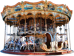 Photo of a carousel, representing how the changing direction of the carousel causes acceleration.