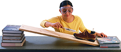 A girl performing  a lab experiment.