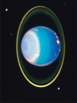 Image of Uranus and its vertically running rings taken by the Hubble Telescope in 1977.