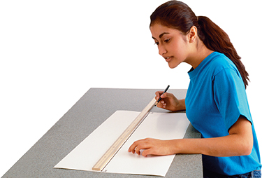 A girl with a meter stick and a large piece of paper preparing to compare the average sizes of the planets to their distance from the sun. 