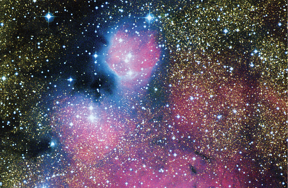 Image of stars and nebula in space used as a background.