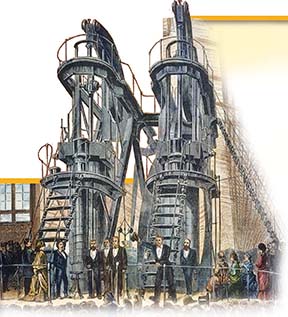 A crowd standing before giant steam engines.