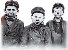 Three boys who work in coal mines.