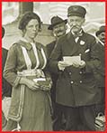 A photo of an immigrant woman with her papers with an immigration official. The image has a caption reading Women's Organization National Prohibition Reform.