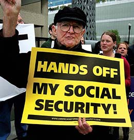 A photo of an elderly man with a sign, "Hands Off My Social Security!"