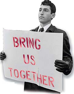 A man holding a sign that says "Bring us together".