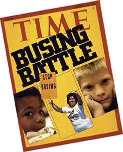 The Time Magazine's cover with the title, "Bustling Battle". Besides title, cover also displays a black boy, a white boy, and a woman in the center holding a picket sign that says "Stop Bussing". 
