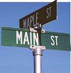 A photo of street signs that say
Main St. and Maple St.