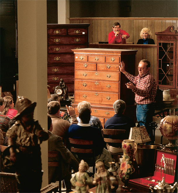 People participate in an auction.